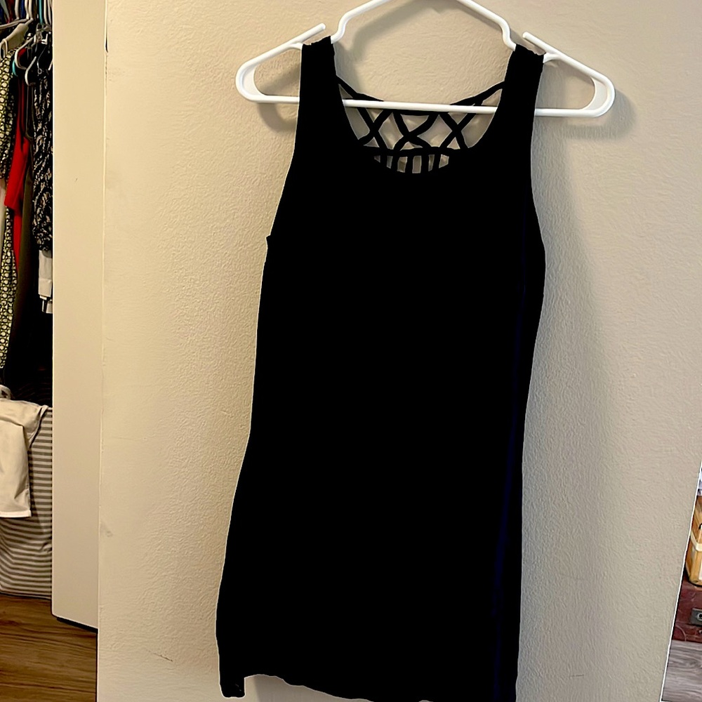 Want & Need brand small black sundress with cutout back
